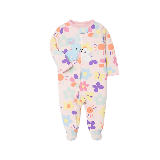 Colorful baby onesie with floral and animal patterns on a white background