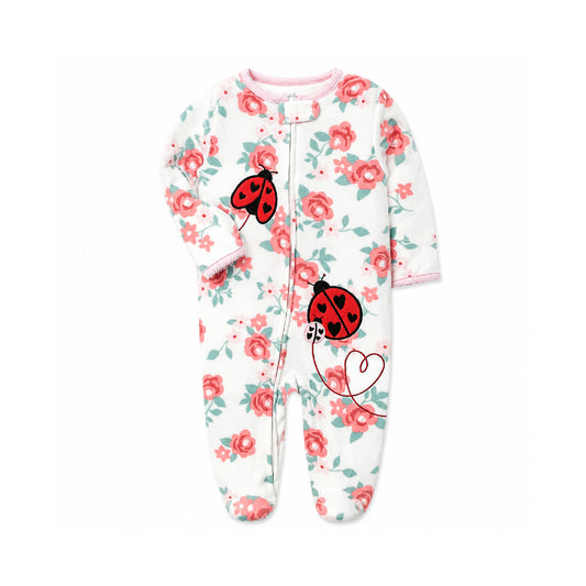 A baby footed sleeper with long sleeves and an all-over floral print featuring red ladybugs and pink roses on a white background.