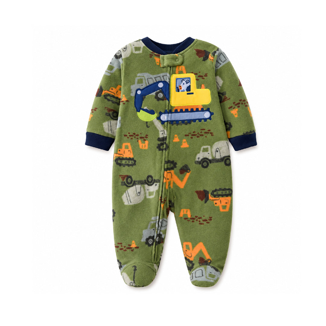 A baby's long-sleeve footed sleeper in olive green with a construction vehicle print, featuring a yellow excavator on the chest and navy blue trim.