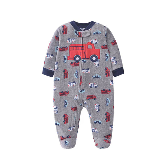 A baby's long-sleeve footed sleeper in heather gray, featuring a red fire truck and small red, blue, and white vehicle patterns, with navy blue ribbed cuffs and collar.