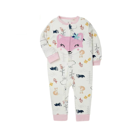 A baby's long-sleeve zip-up footless pajama romper in an off-white color, decorated with a whimsical forest print featuring a large pink fox face on the chest, trees, squirrels, birds, and mushrooms. The cuffs and collar are solid pink.